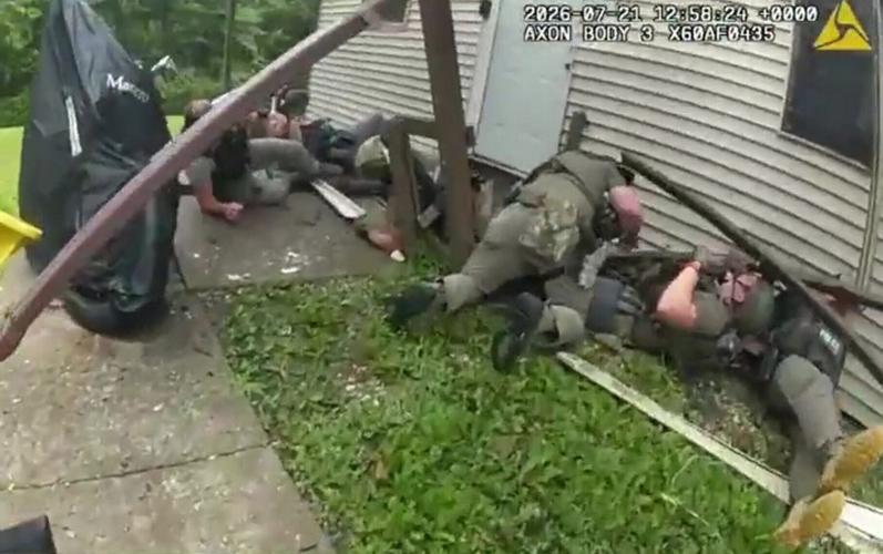 Wooden deck collapses under officers during child sex offender arrest operation