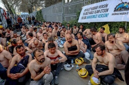 The miners had been on a topless hunger strike outside the Turkish energy ministry since Monday