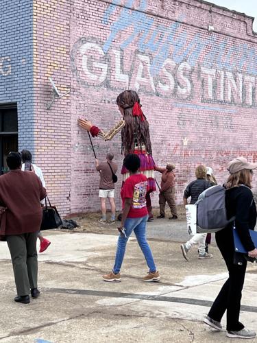 Little Amal puppet wows Selma as crowd gathers to follow her through downtown, photo gallery