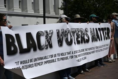 Black voters matter sign at Montgomery rally