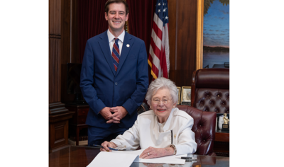 Ivey signs overtime tax law from ADN