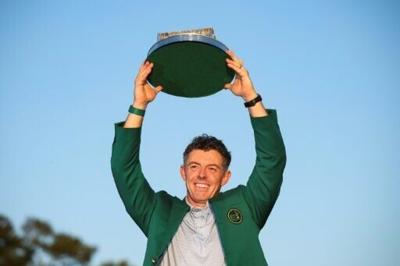 Rory McIlroy lifted the Masters trophy after winning for the second year in a row at Augusta National
