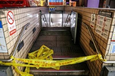 This picture taken and released by Taiwan's Central News Agency (CNA) shows one of the entrances to Taipei Main Station being cordoned off after an attack