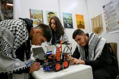 The Palestinian delegation to the World Robot Olympiad in Singapore left without a medal, but with a sense of pride