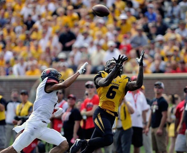 Michael Ford attempts to intercept Back Tavon (copy)