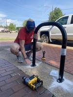 New bike racks and workstation installed downtown  to encourage bike riding, youth empowerment 