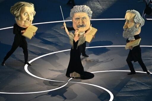 Dancers dressed as the three great masters of Italian opera -- Giuseppe Verdi, Giacomo Puccini and Gioachino Rossini, during the opening ceremony