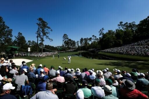 World number one Scottie Scheffler lines up a putt on the 16th green in the third round of the Masters