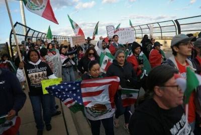 Demonstrators protest against the Trump administration's "Operation Midway Blitz" in Chicago