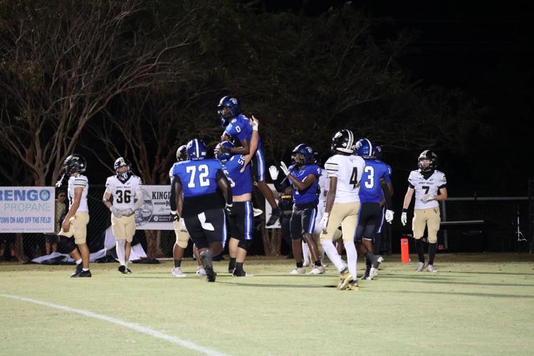 Demopolis football celebrates