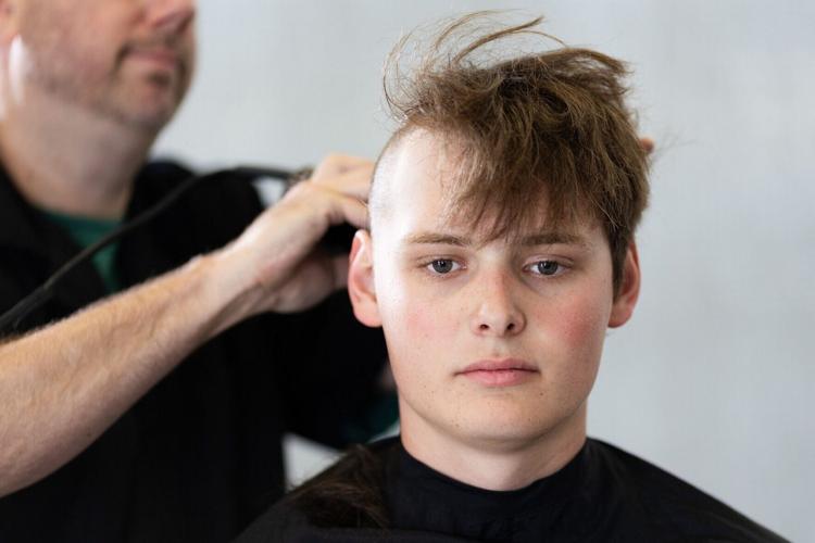 Shouting instructors and shaved heads greet new US Air Force cadets in Colorado