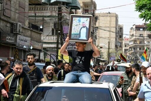 Syria's Druze take up arms to defend their town against Islamists