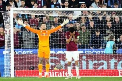 Leeds goalkeeper Lucas Perri reacts after saving a penalty against West Ham