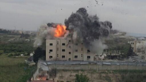 AFPTV footage showing the moment an Israeli strike hits a building in southern Lebanon