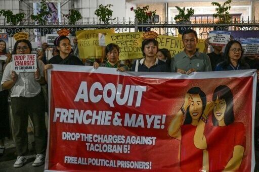 Supporters of detained journalist Frenchie Mae Cumpio stage a demonstration calling for her release ahead of Thursday's verdict