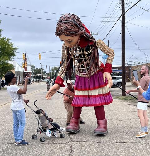 Little Amal puppet wows Selma as crowd gathers to follow her through downtown, photo gallery