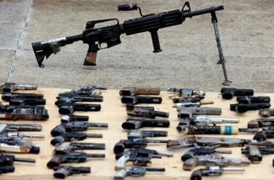 Mexicans offered $1,300 to hand in a machine gun
