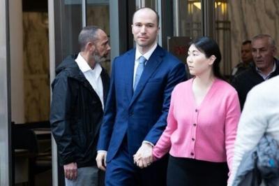 OpenAI President Gregory Brockman and his wife Anna Brockman depart court