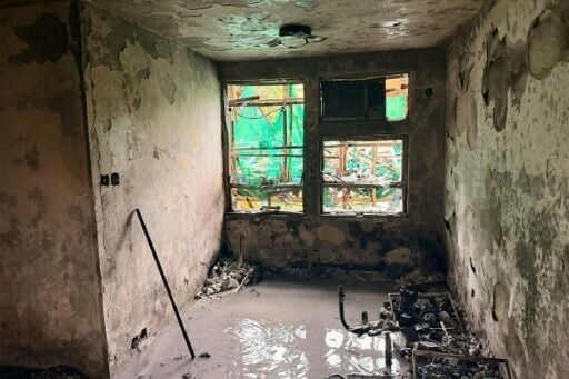 This Hong Kong Police Force handout shows the inside of an apartment in the aftermath of the catastrophic fire at the Wang Fuk Court residential estate