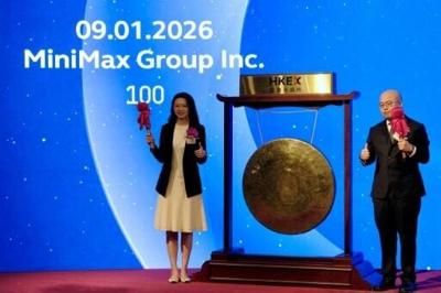 Shanghai-based AI startup MiniMax's CEO Yan Junjie (R) and Co-founder and COO Yun Yeyi (L) attended the firm's listing ceremony at the Hong Kong stock exchange, after which its shares soared
