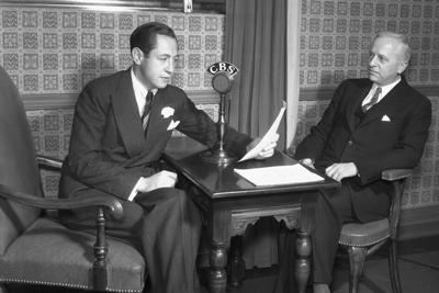 Former CBS President William S. Paley, left, who once called broadcasting 'an instrument of American democracy,' speaks on his radio network in 1934.