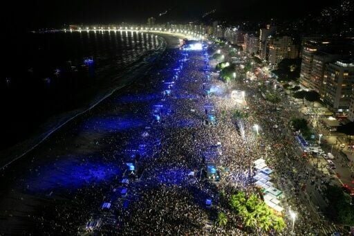 Crowds pack Copacabana Beach in Rio de Janeiro, Brazil during Shakira's concert