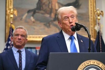 US President Donald Trump (R), alongside Secretary of Health and Human Services Robert F. Kennedy Jr. (L), speaks about autism at the White House in Washington, DC on September 22, 2025