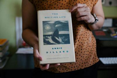 Annie Dillard’s attention to craft inspired many writers, including novelist Celeste Ng, who holds a copy of Dillard’s reflections in her personal library.
              Sophie Park/The Washington Post via Getty Images via The Conversation