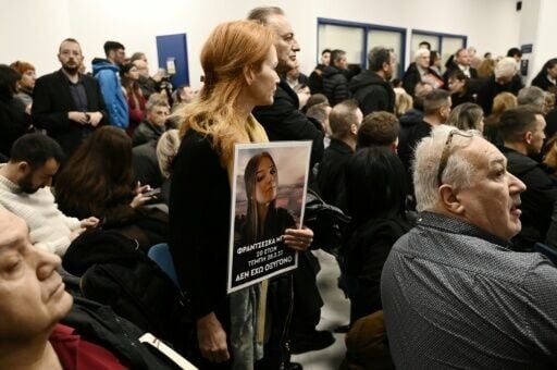 The court was so crowded on the opening day that the trial was adjourned amid chaos