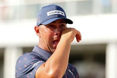American Gary Woodland wipes away tears after winning the PGA Houston Open for his first title since taking the 2019 US Open and the first since undergoing brain surgery in 2023