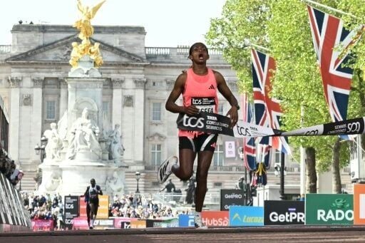 Ethiopia's Tigst Assefa wins the London Marathon in a new women's-only world-record time
