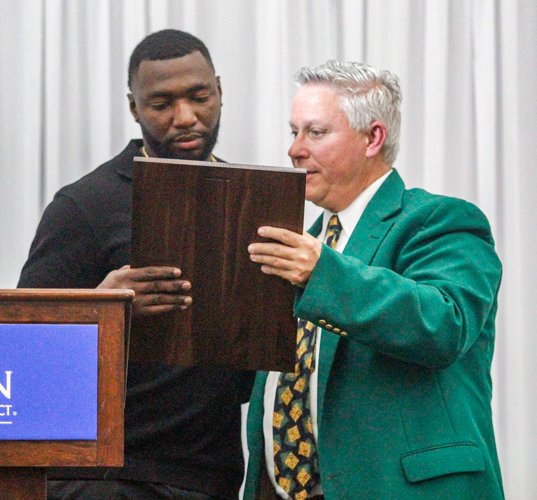 Hall of Honor-Michael Walker receives plaque from Michael Groves.png