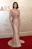 Oscars red carpet: 'Wicked,' white and lots of sparkle