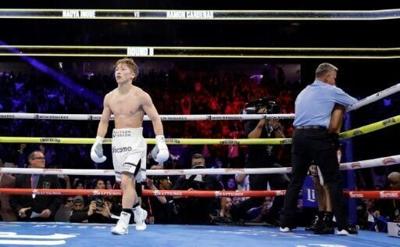 Inoue knocked down but stops Cardenas in eighth to keep crown