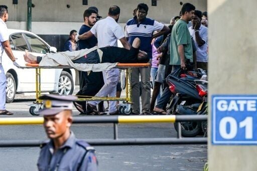 An injured Iranian sailor rescued from their frigate IRIS Dena after a US submarine torpedoed it off Sri Lanka's coast amid the Middle East war, receives treatment at the Karapitiya hospital in Galle on March 5, 2026