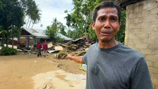 'Swept under': Indonesia flood victim tells survival story