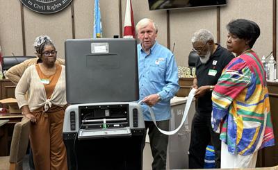 Election officials prepare absentee ballots Selma