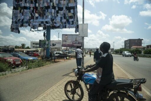 Artist Emmanuel Aggrey Tieku hopes passersby will pause and think about the amount of waste generated by fast fashion
