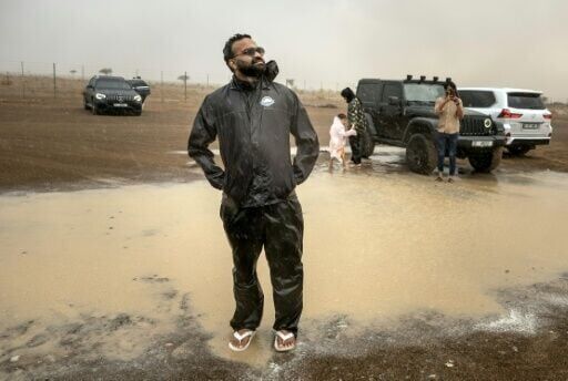 Monsoon-loving Indian expats chase rain in UAE desert