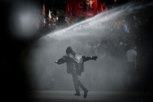 Masked protesters attack Socialists at France May Day rally