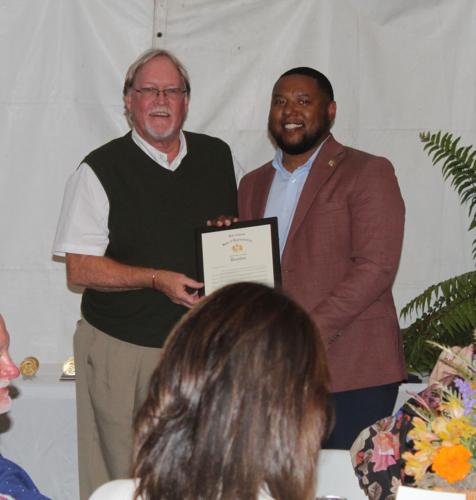 Robert Stewart with resolution for Black Belt Treasures