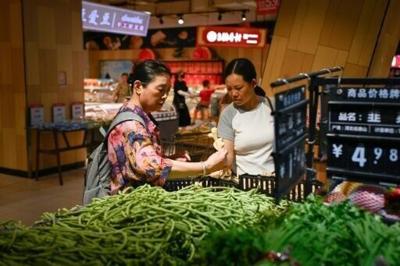 China's snaps 4-month consumer decline but factory price deflation deepens