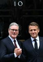 Macron, Starmer talk Channel migration as UK visit gets political