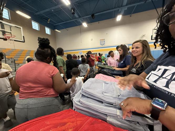 Law firm at back to school event