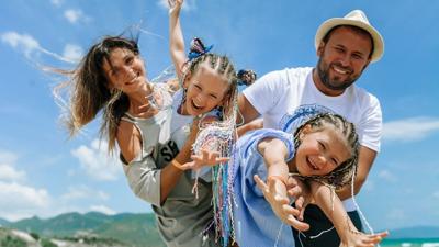 Happy family on vacation Unsplash