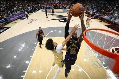 LeBron James of the Los Angeles Lakers, going in for a dunk, was named to his 22nd consecutive NBA All-Star Game
