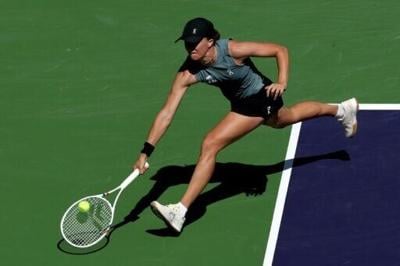 World number two Iga Swiatek is through to the quarter-finals at Indian Wells after a comfortable victory over Karolina Muchova