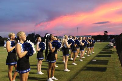 Demopolis cheer team at sunset