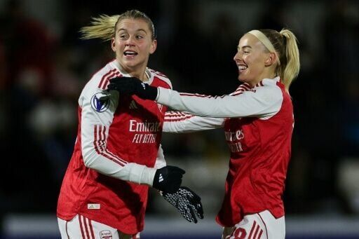 England striker Alessia Russo (L) got both goals for Arsenal in their win over Real Madrid