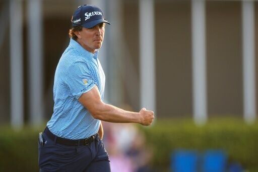 Colombia's Nico Echavarria celebrates a birdie at the 17th hle on the way to victory in the US PGA Tour Cognizant Classic in Florida